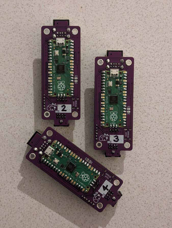 three usb3sun rev A3 boards, bottom sides fully assembled with serial numbers 2, 3, 4