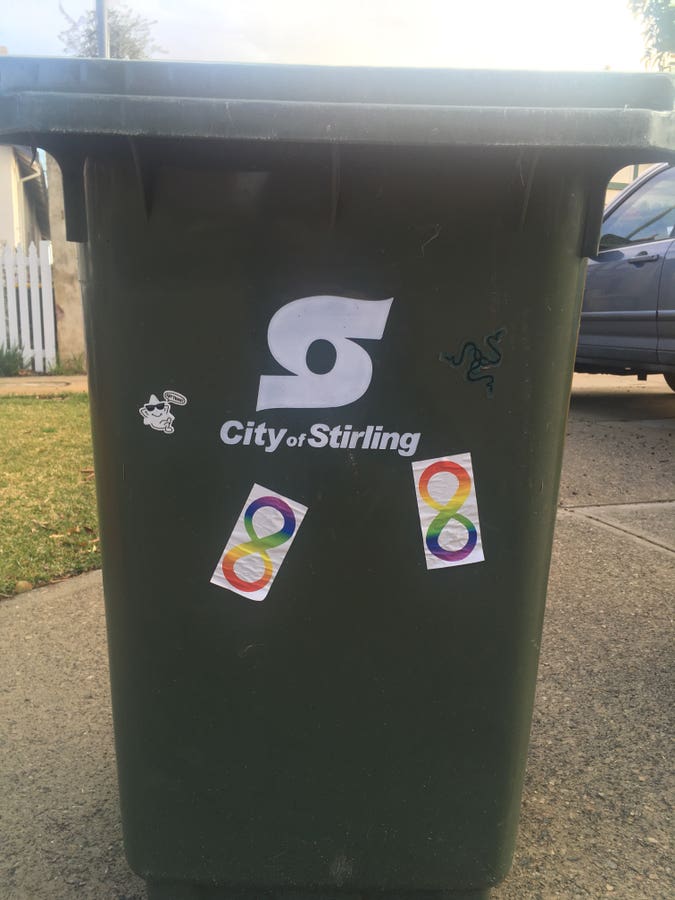 same bin, city of stirling, with two more rainbow infinity stickers