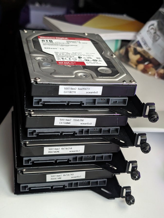 those four disks, now with labels printed by a label printer