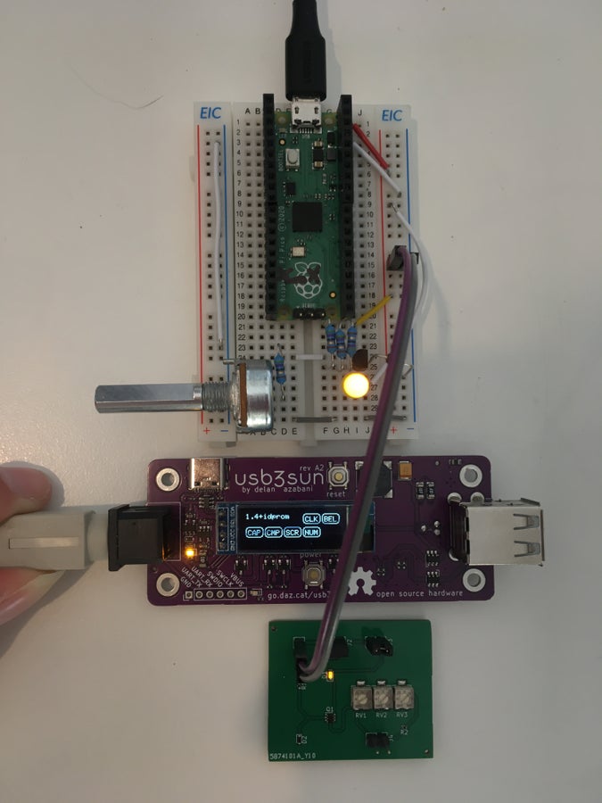 top: breadboard with a prototype zener diode current source (1N4728 + BC337 + pot), and a dead pico used as the world’s biggest micro-usb to vbus breakout board

middle: usb3sun rev A2 with its vsun indicator led still too bright

bottom: test board with the same model of led at a much more reasonable brightness, thanks to yet another zener diode current source (CMOZ1L8 + MMDT2222A + three pots)