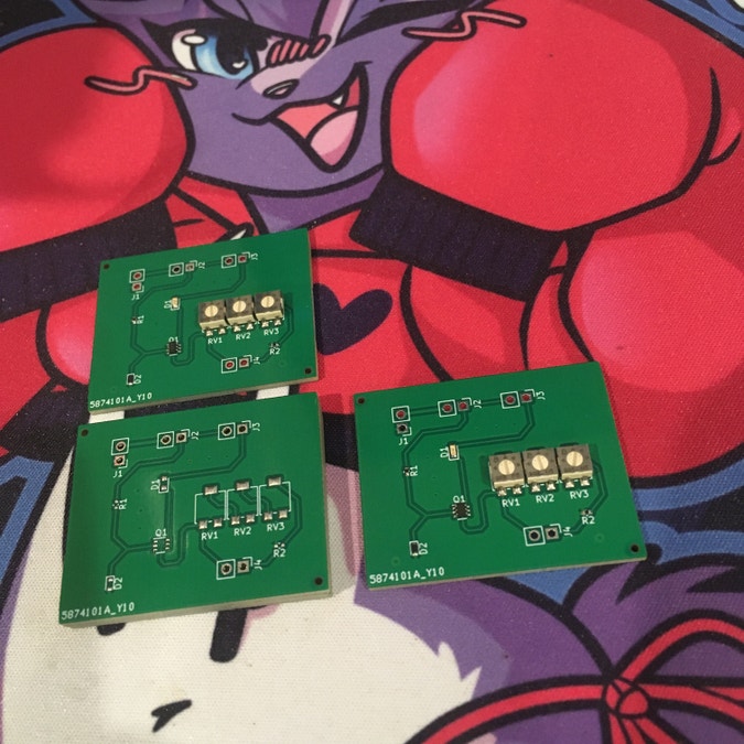 led brightness test boards, two assembled out of five, with a zener diode current source, a series of pots to adjust the current, and a yellow led